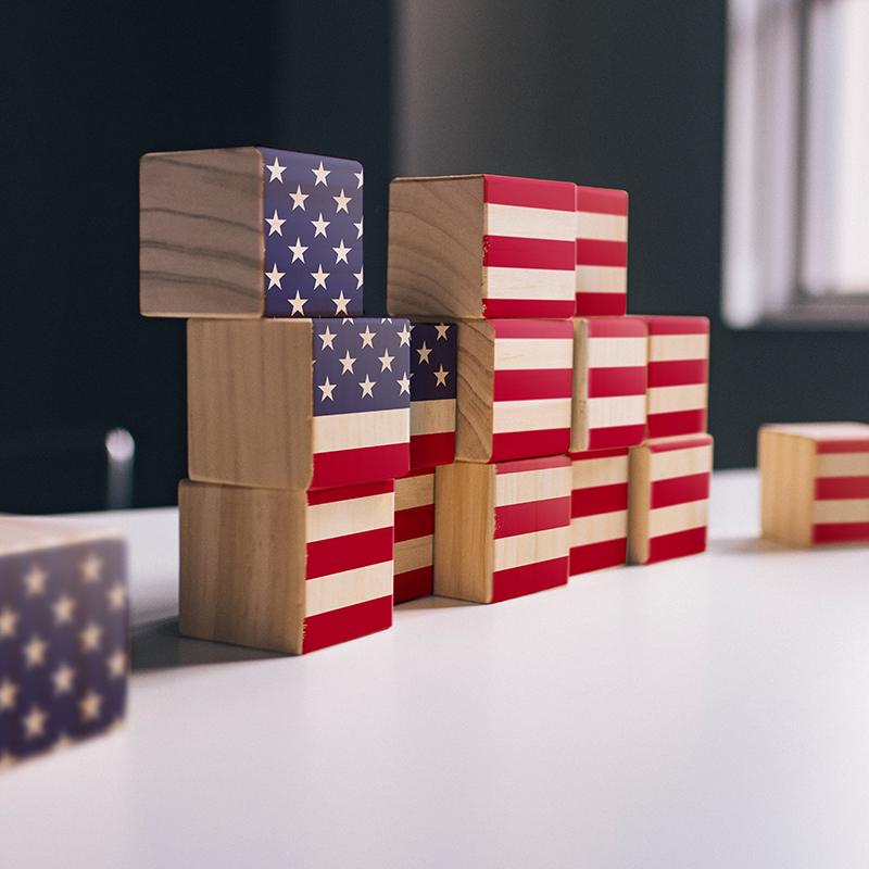 Wooden blocks stacked together to make the American flag