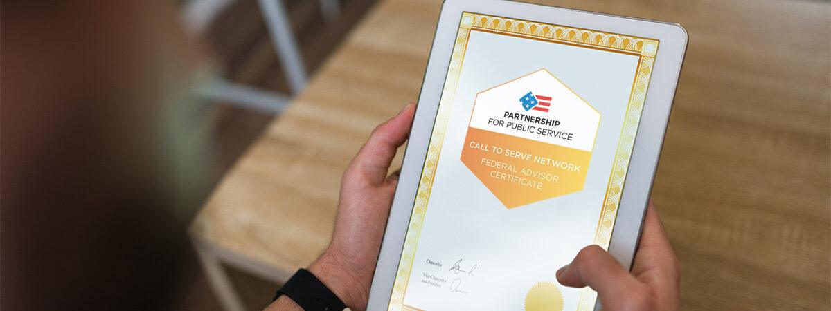 Person holding a tablet