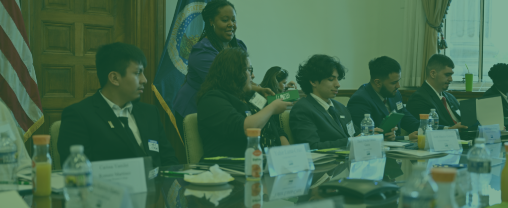 Teal filtered image of public service workers at a government desk