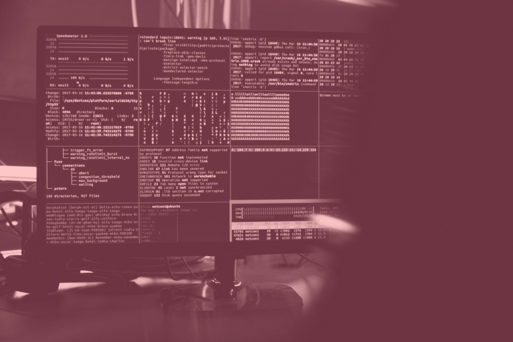 Magenta filter on computer desktop with multiple code browsers open